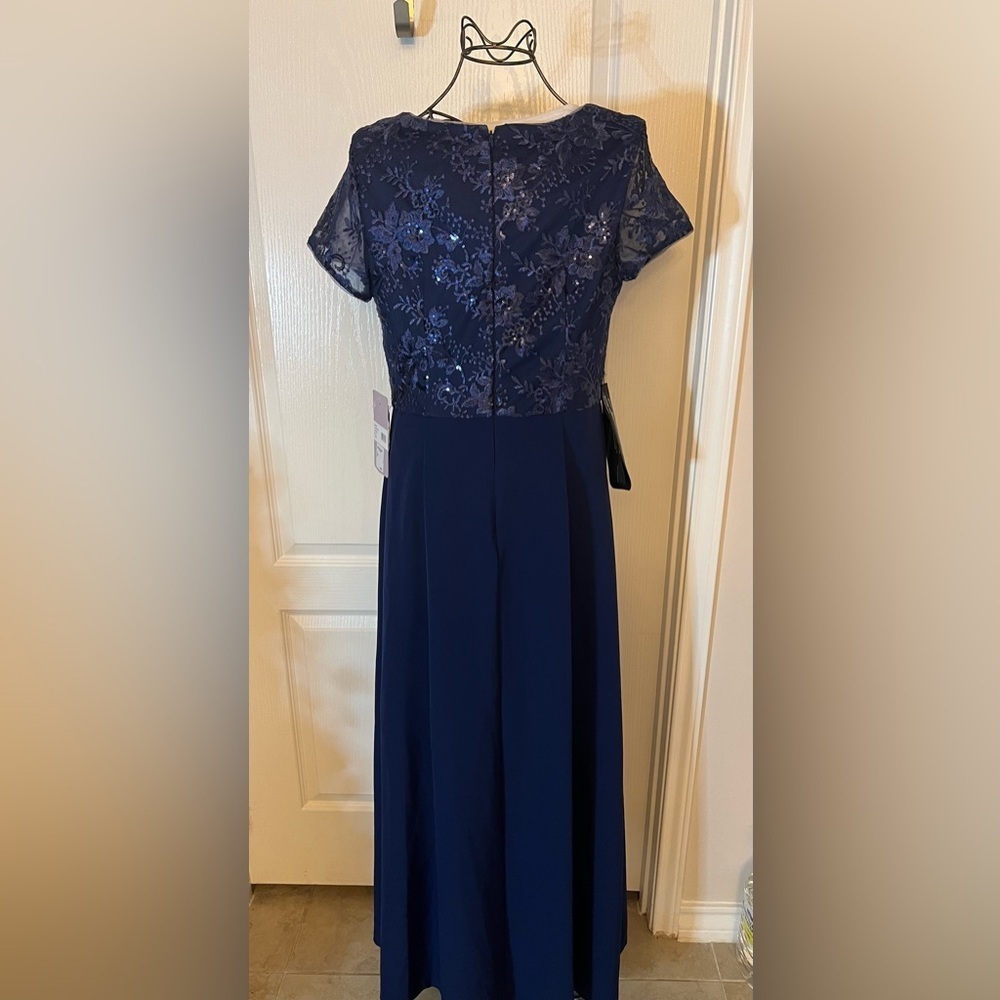 Rae Floral Embroidered Bow Detail A-Line Gown
JS Collections - Picture 4 of 13